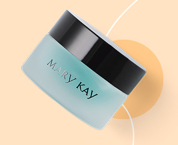 Mary Kay Indulge® Soothing Eye Gel in front of orange circle and white line