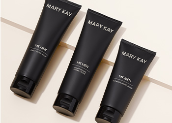 The MKMen regimen of cleanser, shave cream and moisturizer lined up in a row